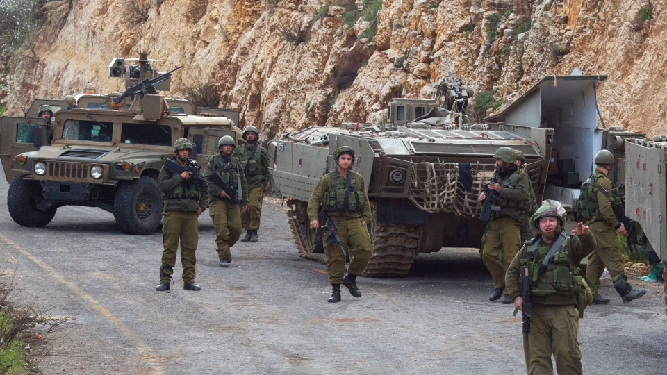 Israel military fires artillery into Lebanon in response to cross-border rockets