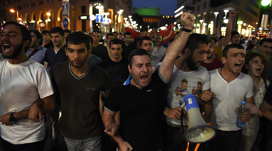 Protesters Clash with Police in Yerevan During the Ongoing Hostage Situation