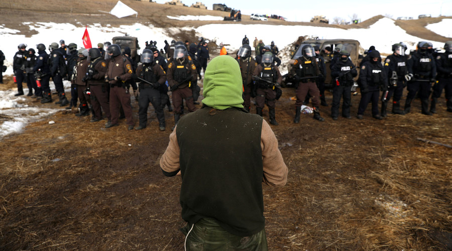 Police & military clear DAPL protest camp, dozens arrested, protesters start fires (Photo & Video)