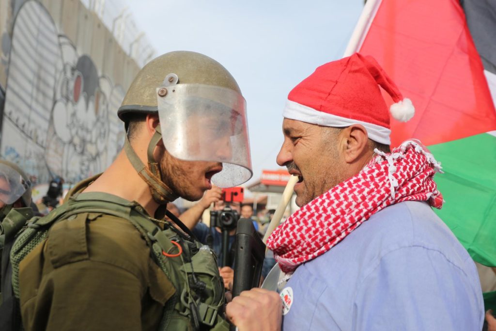 In Photos: Israeli Forces Clash With Palestinian Santa Clauses On Christmas Eve