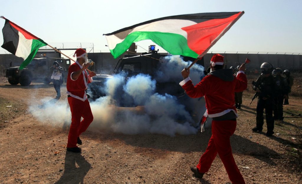 In Photos: Israeli Forces Clash With Palestinian Santa Clauses On Christmas Eve