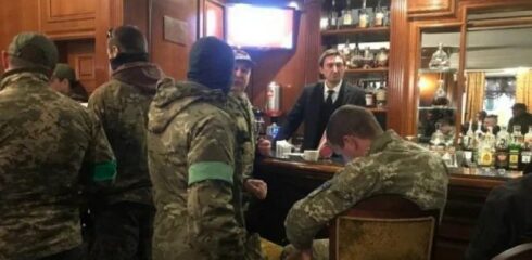 Hemligheten för ukrainska militanter med gröna armband och deras brott